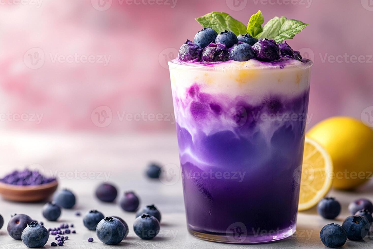 Layered Blackberry Smoothie in Glass Healthy Refreshing Berry Drink photo