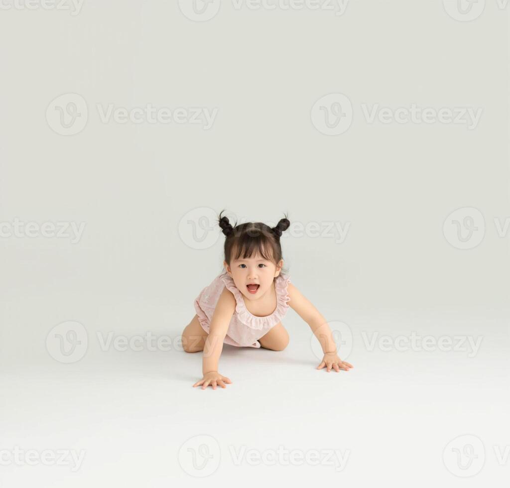 A little girl crawling on the floor photo