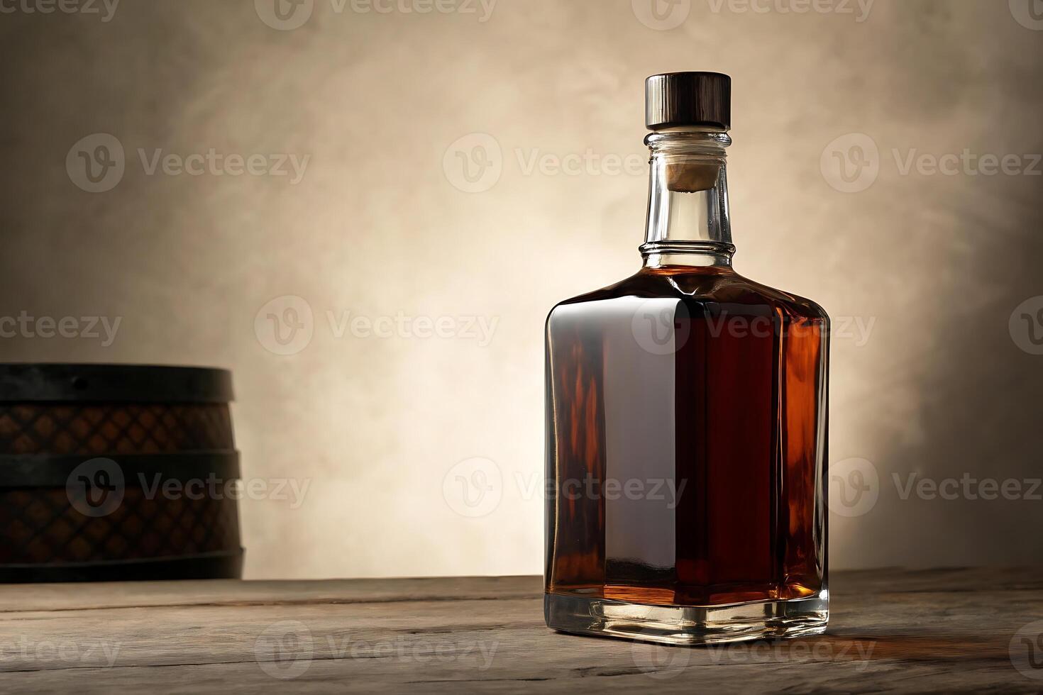 A bottle of whiskey sits on a wooden table photo