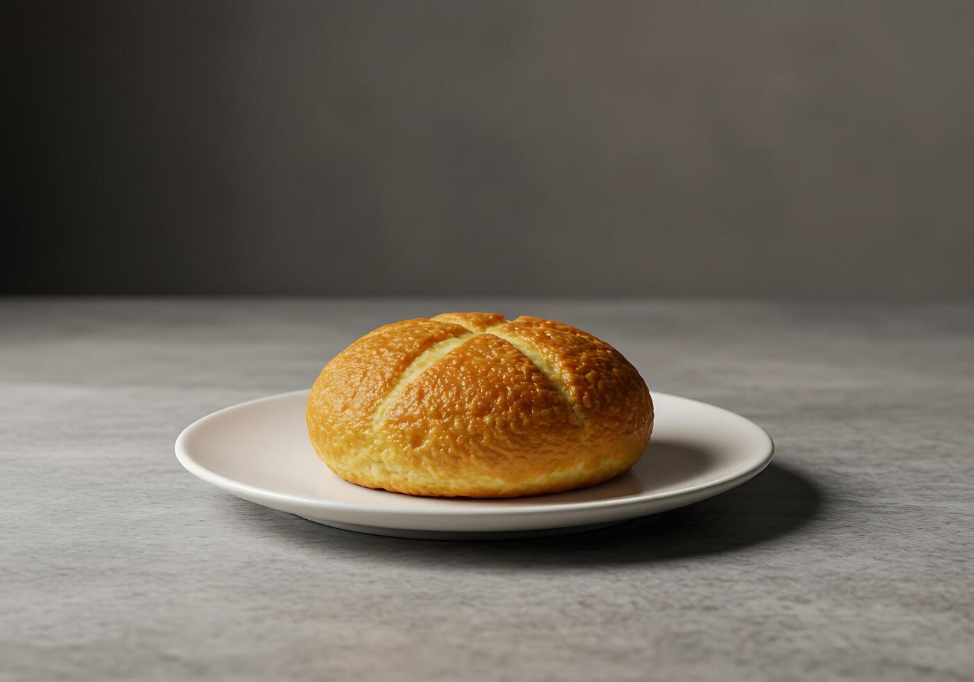 A baked bread on a plate on a table photo