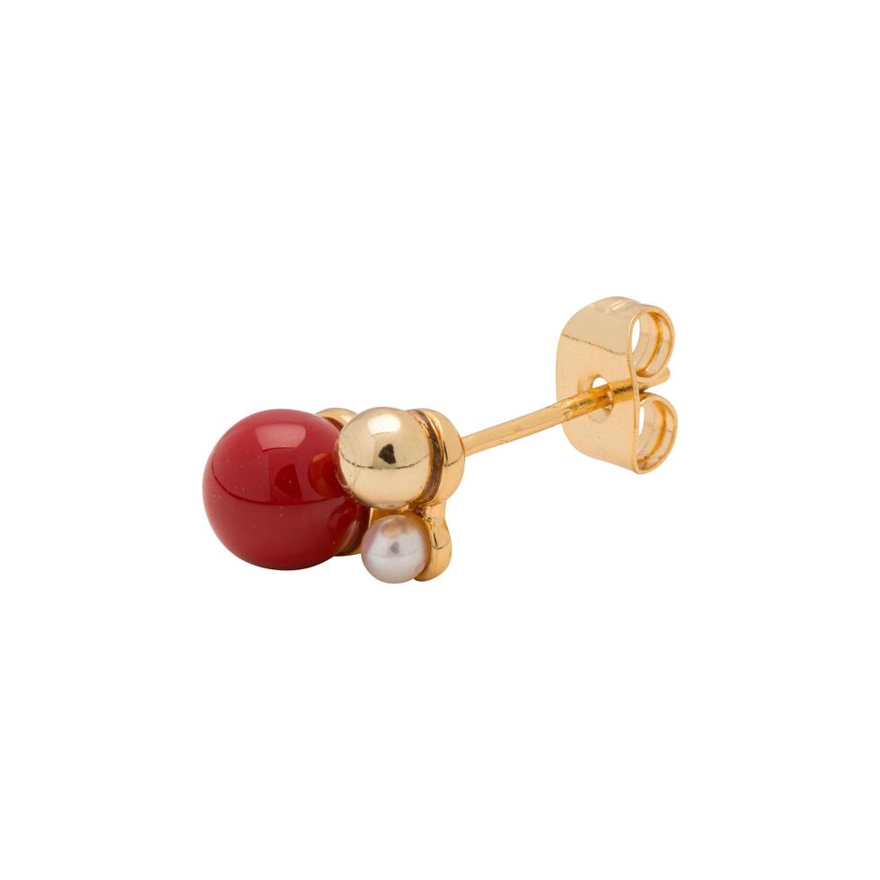 Elegant gold earring adorned with red coral and pearl accent isolated photo
