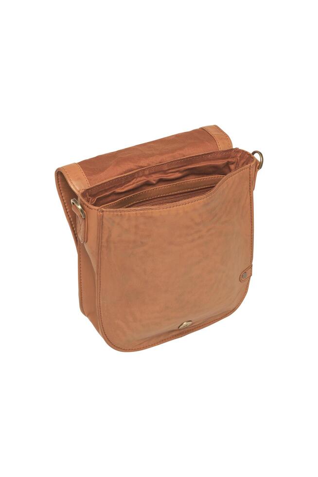 Open saddlebag in light brown leather ready for travel and storage solutions photo