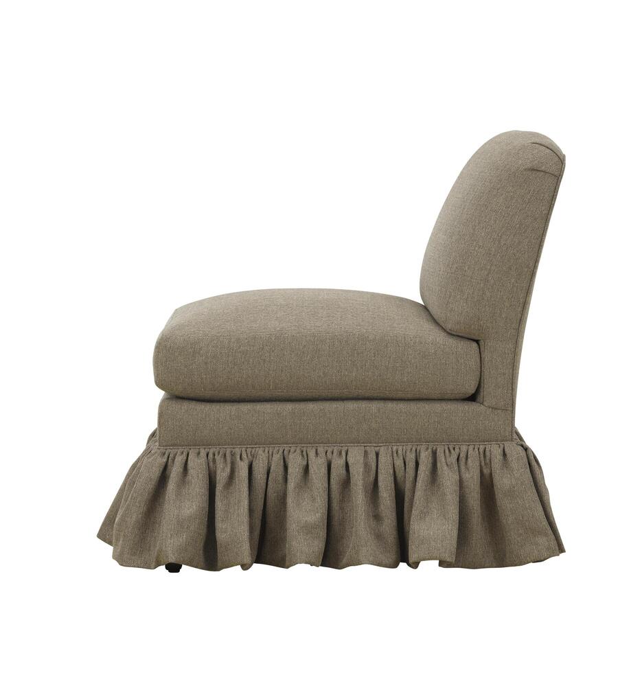 Elegant light brown armless accent chair with ruffled skirt on white background photo