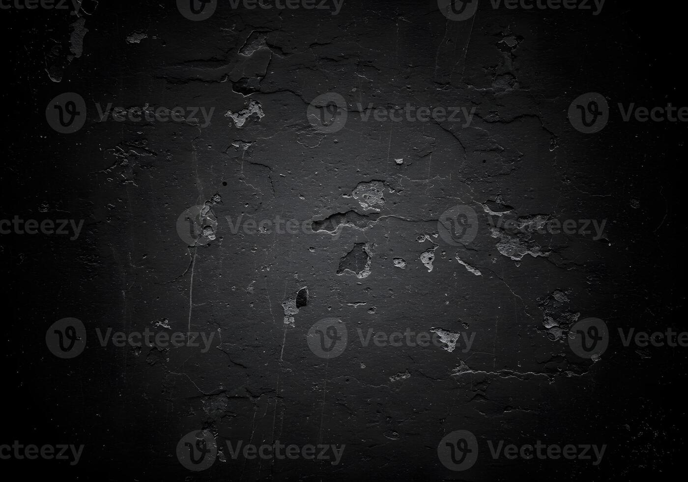 A black and white photo of a wall with a black paint