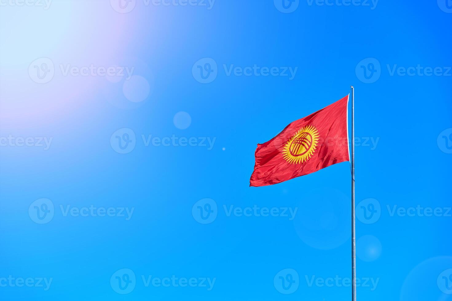 National Kyrgyzstan flag on Bishkek central Ala-Too square. photo