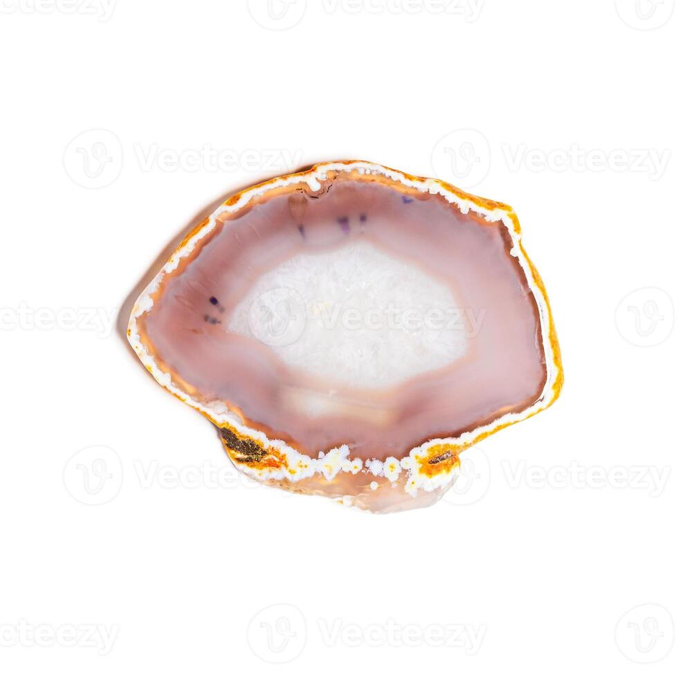 Cross section of beige pink agate crystal isolated on white background, natural slice mineral stone macro closeup, agate crystal surface, beautiful gemstone. Precious stone pastel color photo