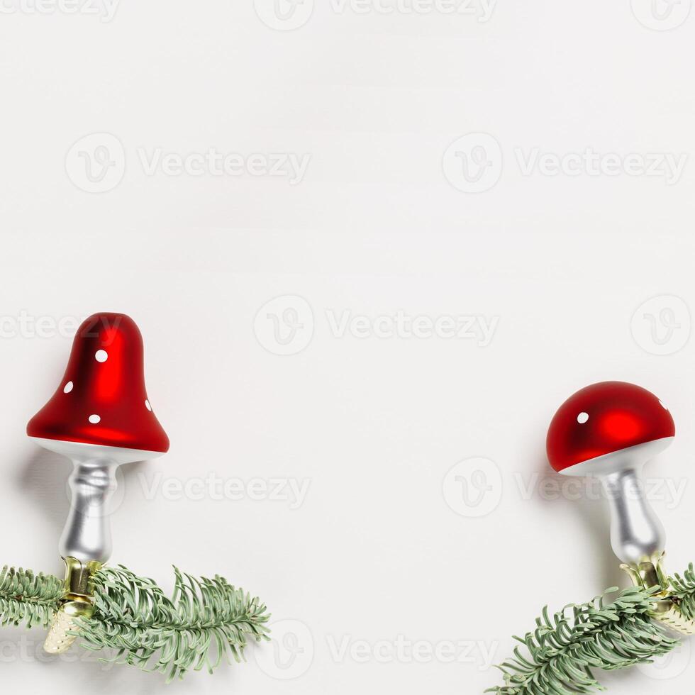 Christmas botanical ornaments fly agaric mushrooms with red cap and white dots, on natural green christmas fir tree branches on white background with copy space. photo