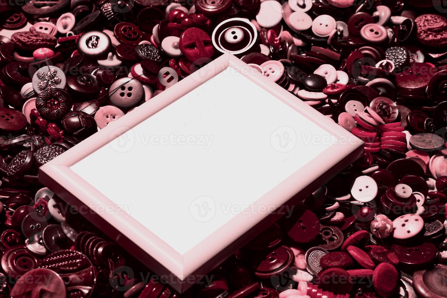 Pink tones,frame on tailor buttons photo