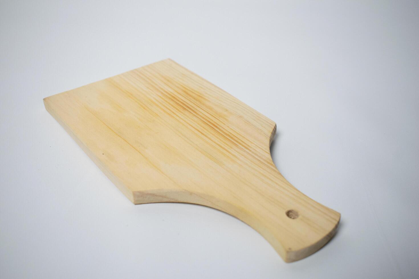 Wooden cutting boards are suitable for use in the kitchen. photo