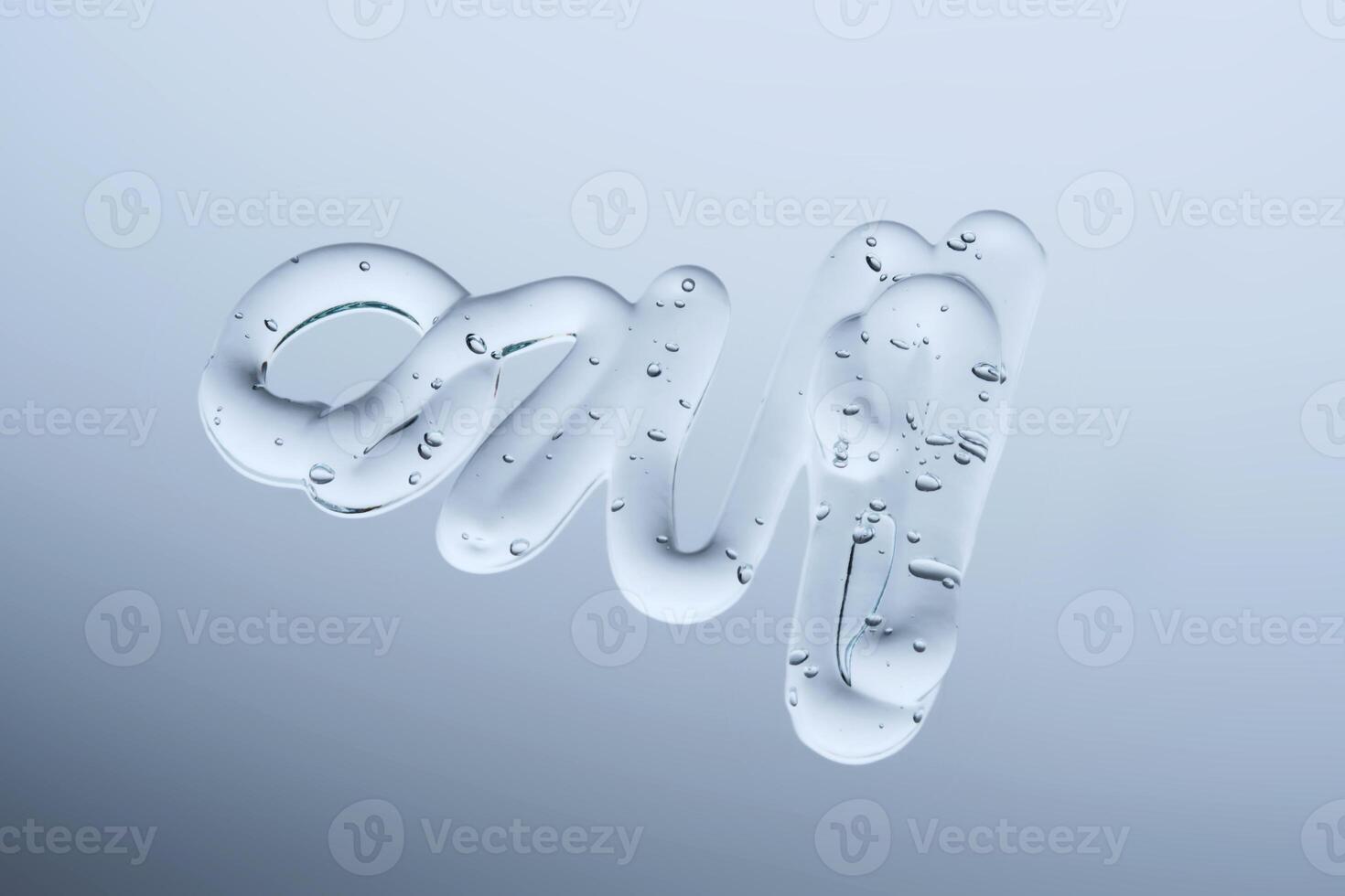 The texture of a cosmetic gel on a gray background. photo