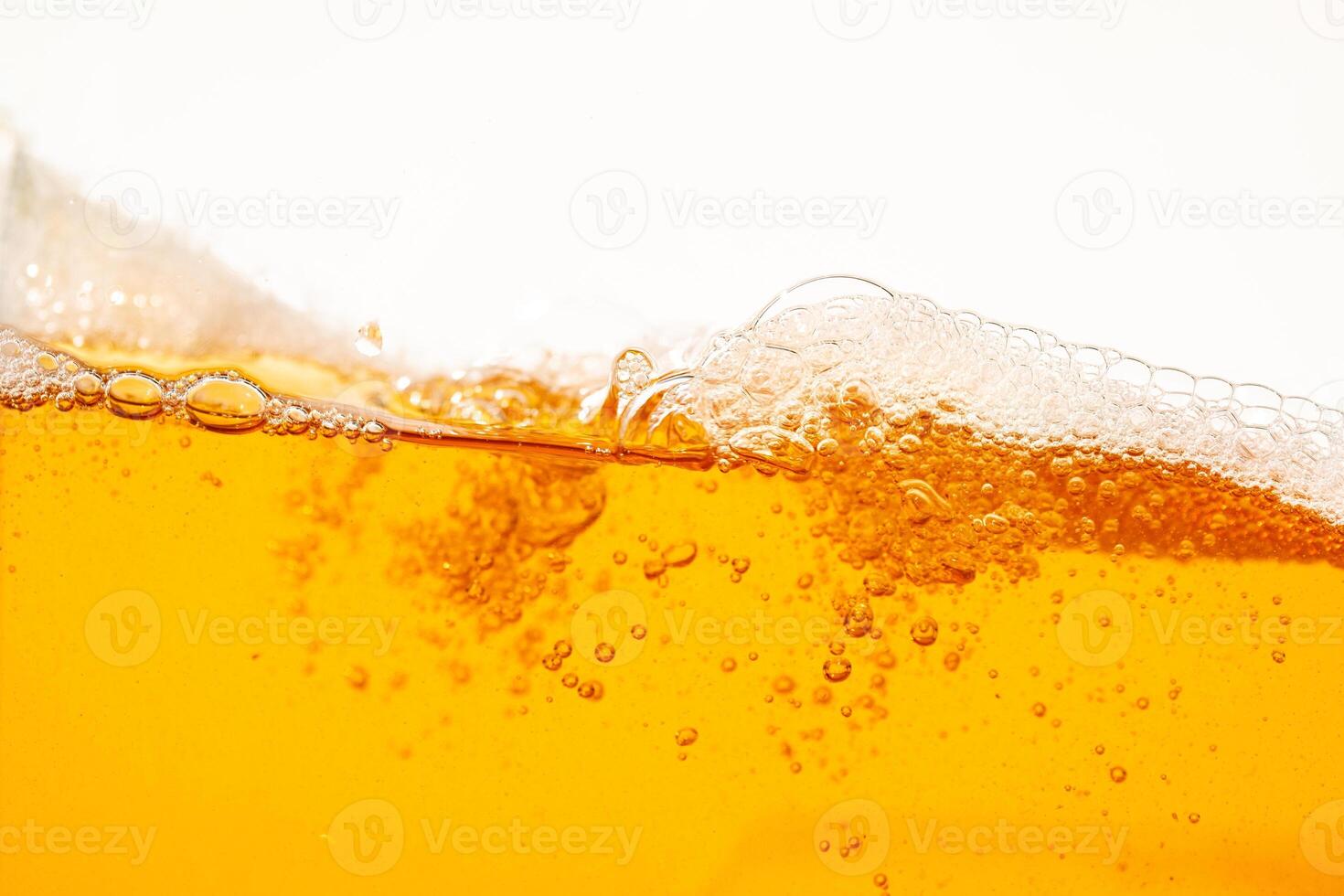 Close up bright orange Oil or beer splash texture and nature waves, Beautiful waves curve and little bubbles smooth for graphic design and background, Oil Bubbles, Soft beer bubbles, Sele photo