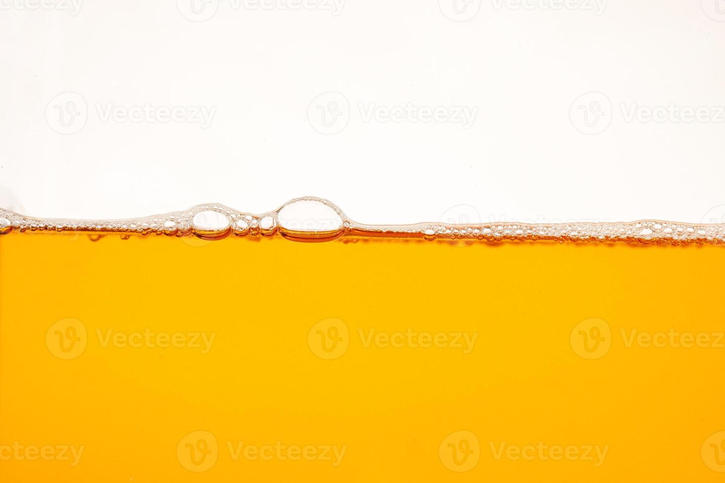 Close up bright orange Oil or beer splash texture and nature waves, Beautiful waves curve and little bubbles smooth for graphic design and background, Oil Bubbles, Soft beer bubbles, Selec photo