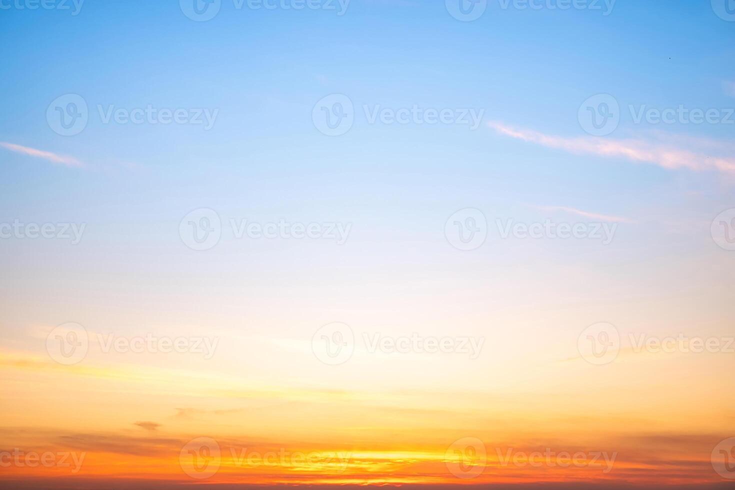 Beautiful , luxury soft gradient orange gold clouds and sunlight on the blue sky perfect for the background, take in evening,Twilight, Large size, high definit photo