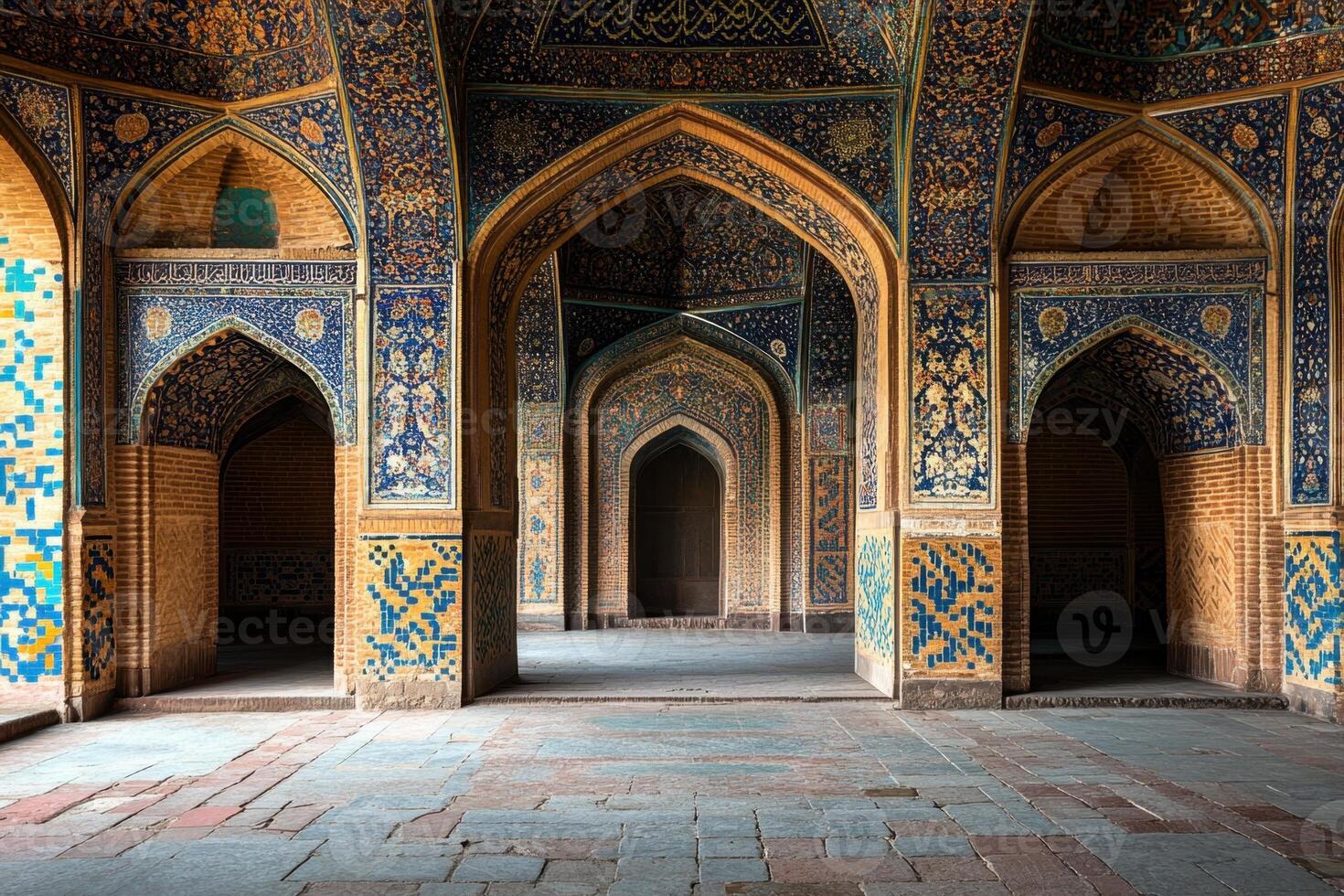 the interior of a mosque with blue and yellow tiles photo