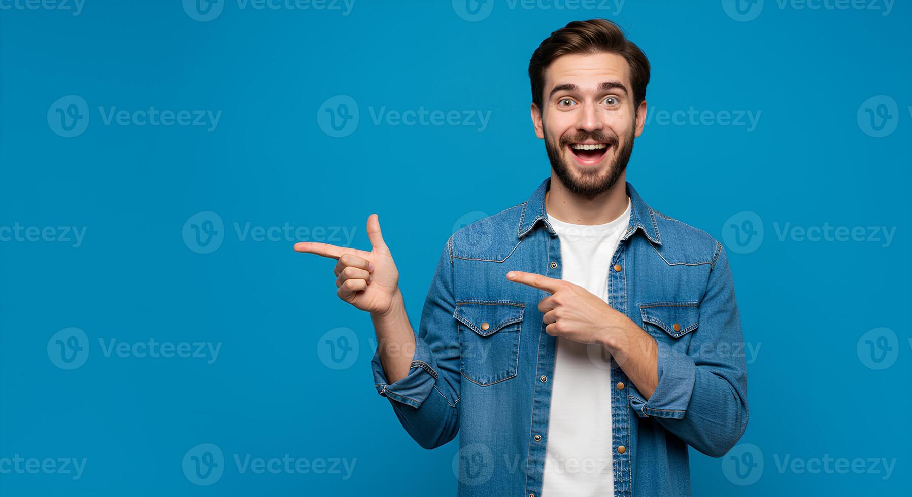 Excited Man Pointing to the Side, Ready to Showcase an Offer photo