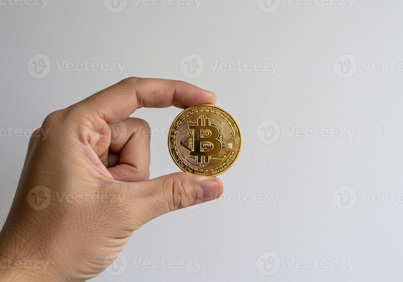 Bitcoin Coin on Wooden Surface with Bokeh Lights photo