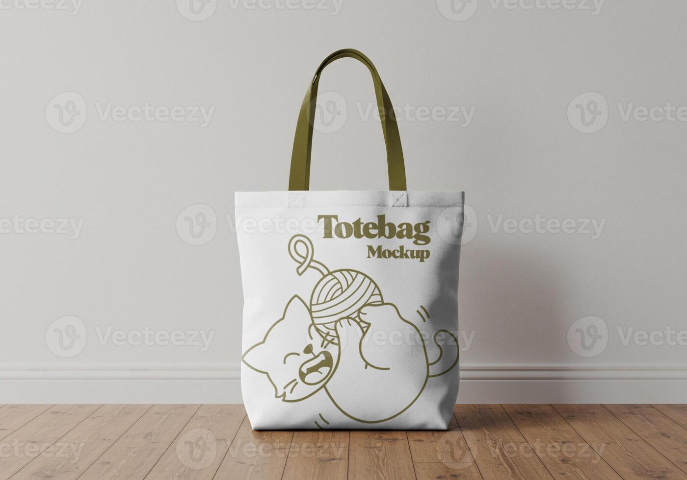 White totebag with green handle on floor and white background photo