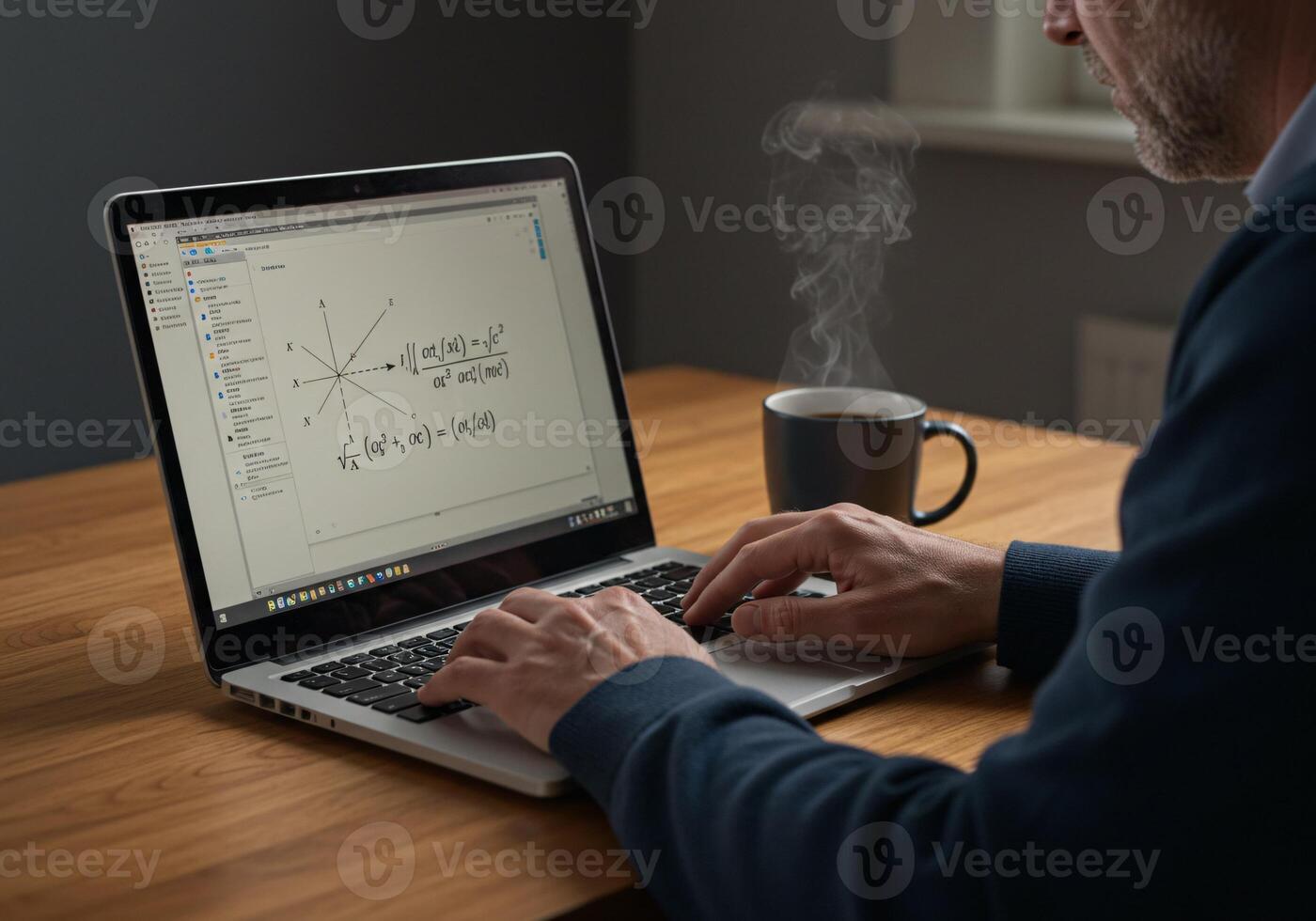 Man working on a laptop, displaying mathematical equations, with a coffee cup photo