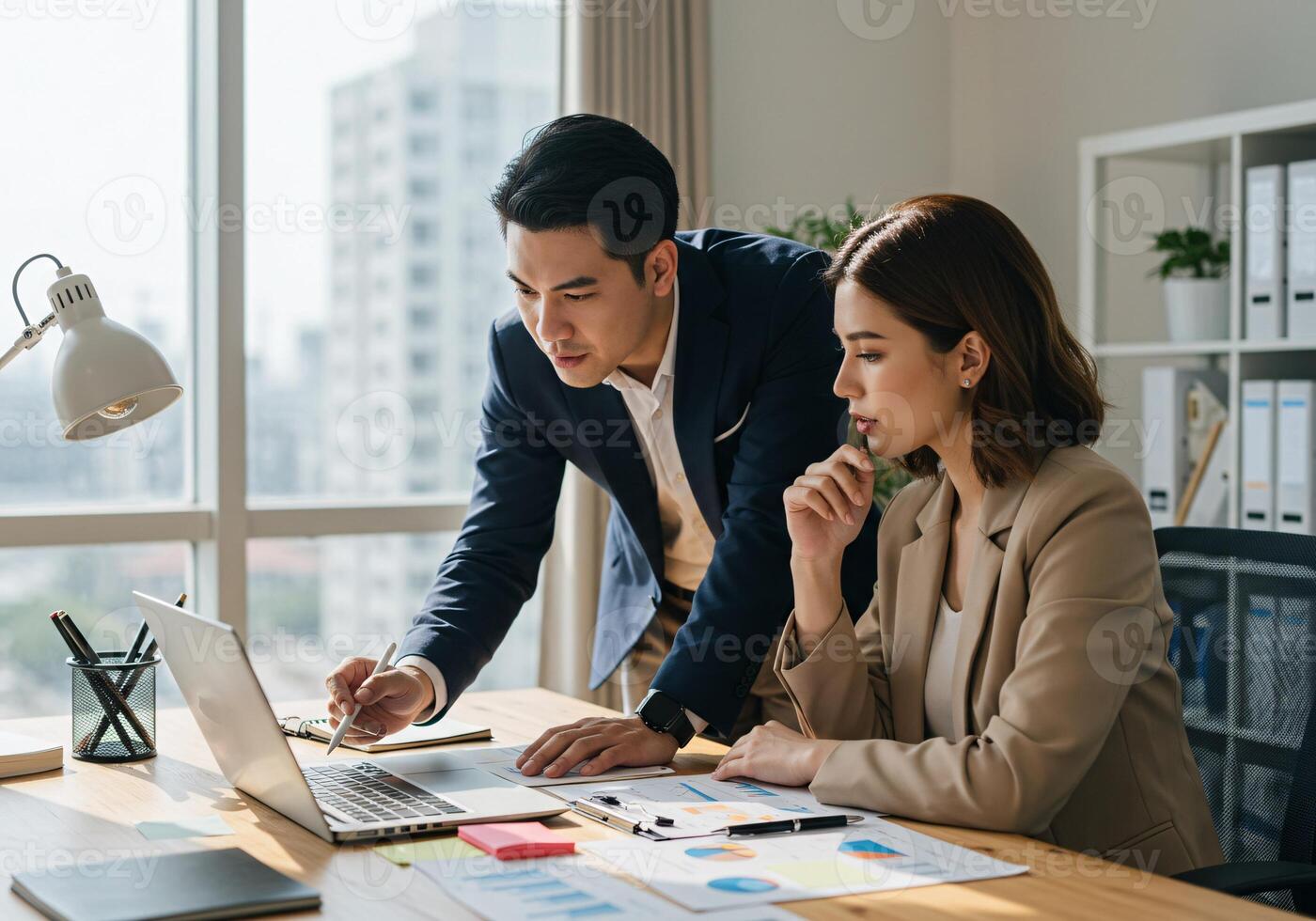 Team of Business Professionals Analyzing Data photo