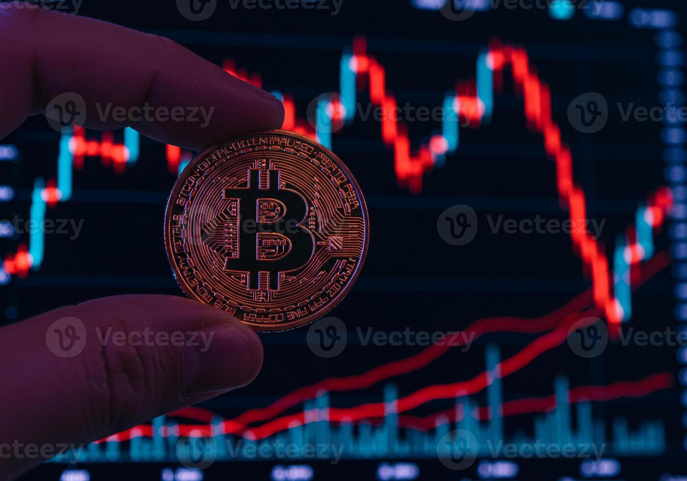 Close up of Hand Holding Bitcoin Coin on a white background photo