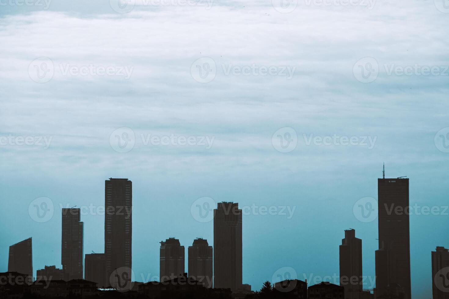 Silhouette of skyscrapers with cloudy sky. Istanbul view photo