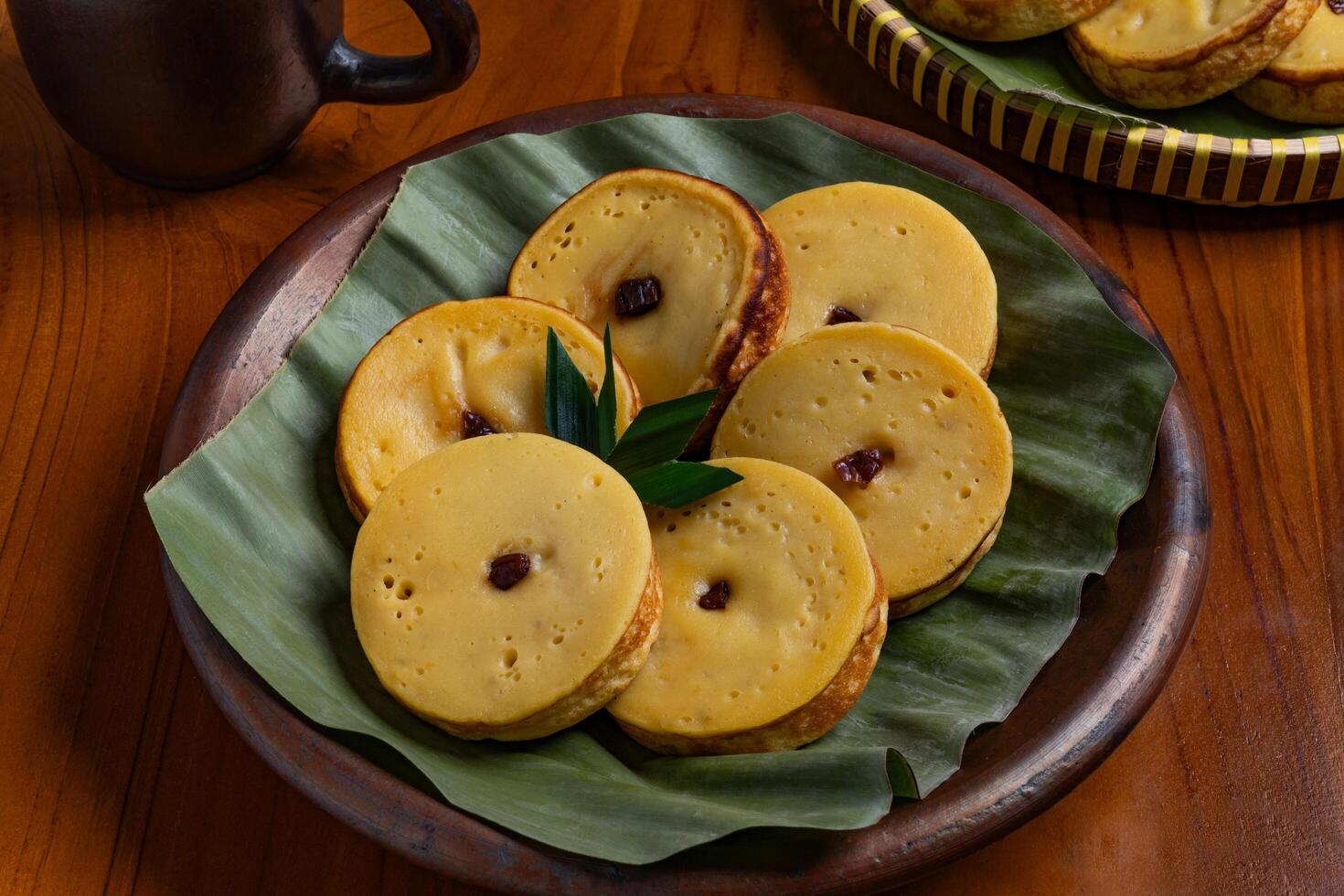 Kue lumpur brings the rich flavor of Indonesian tradition and heritage background photo