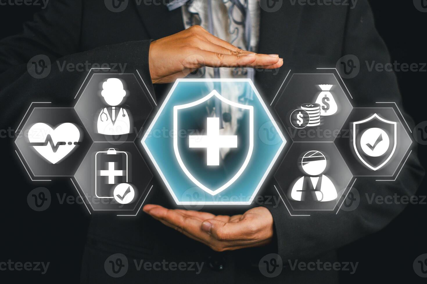 Conceptual image of health insurance with hands shielding medical and financial icons, symbolizing protection and security. photo