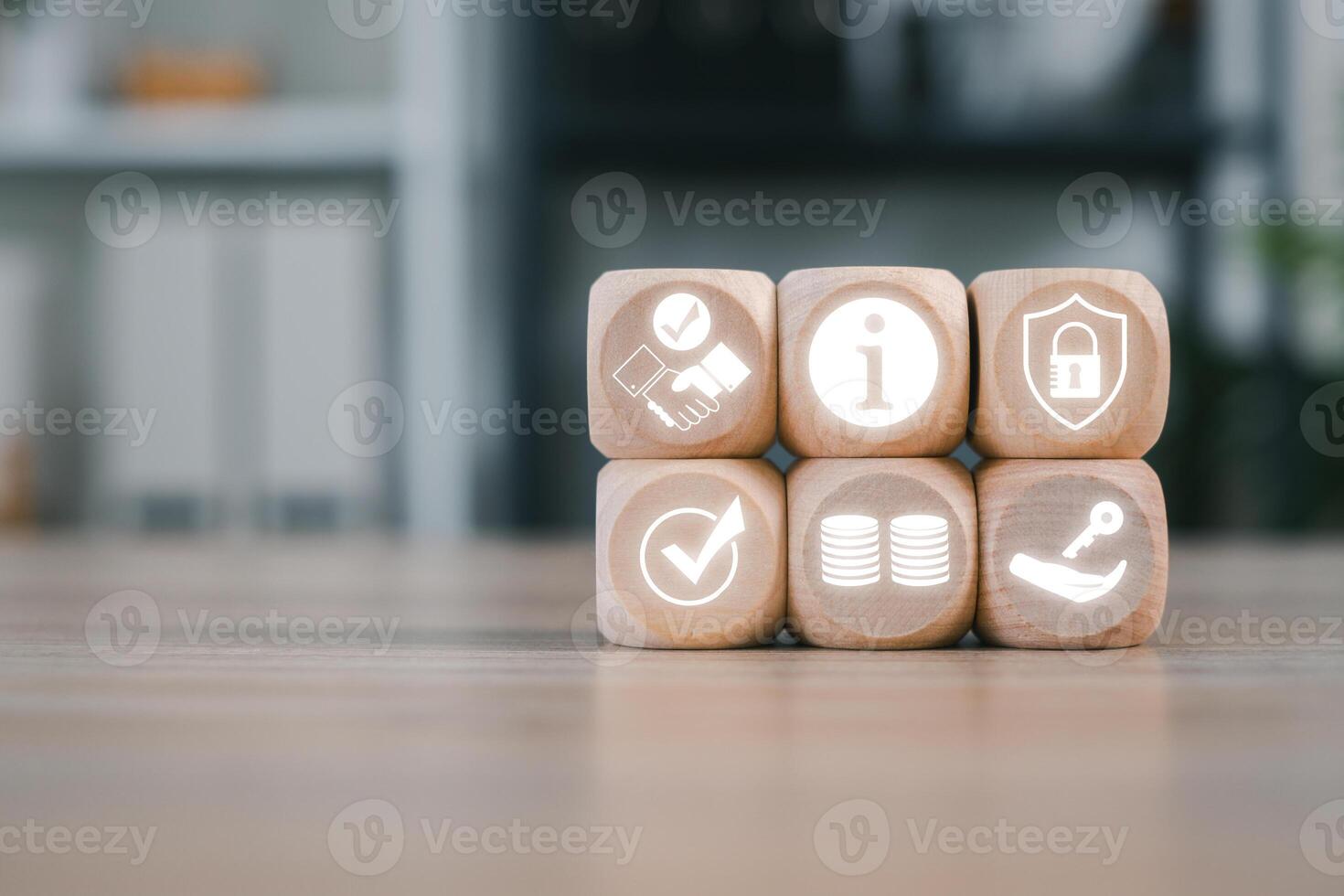 Wooden blocks with icons symbolizing confidentiality, security, and information management in a business context. photo