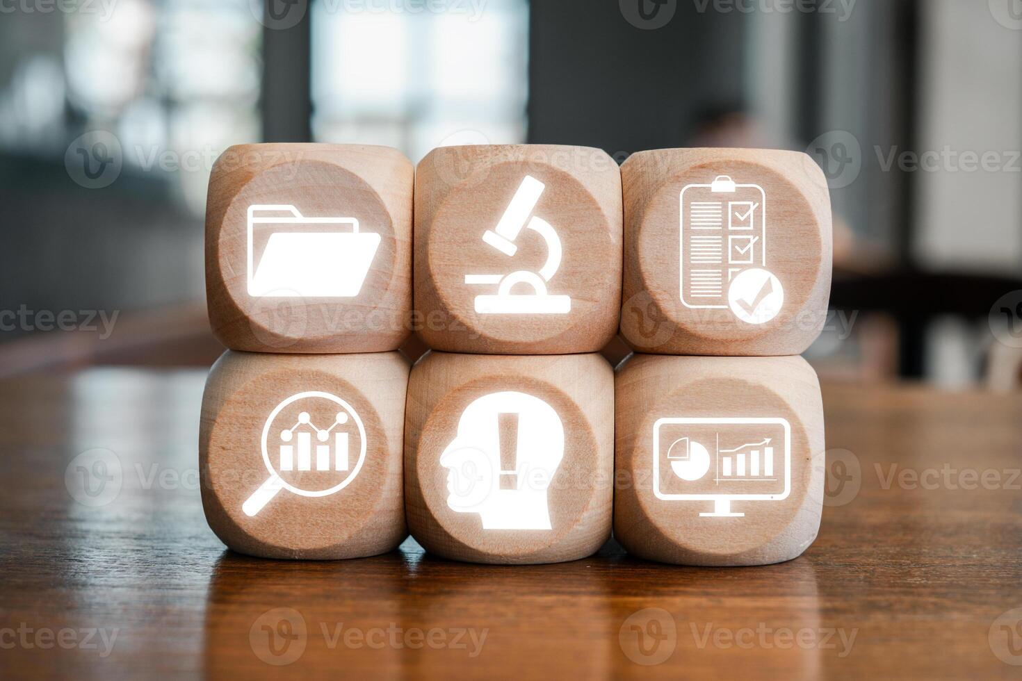 Wooden blocks with icons symbolizing research, analysis, and data, ideal for illustrating case study concepts. photo