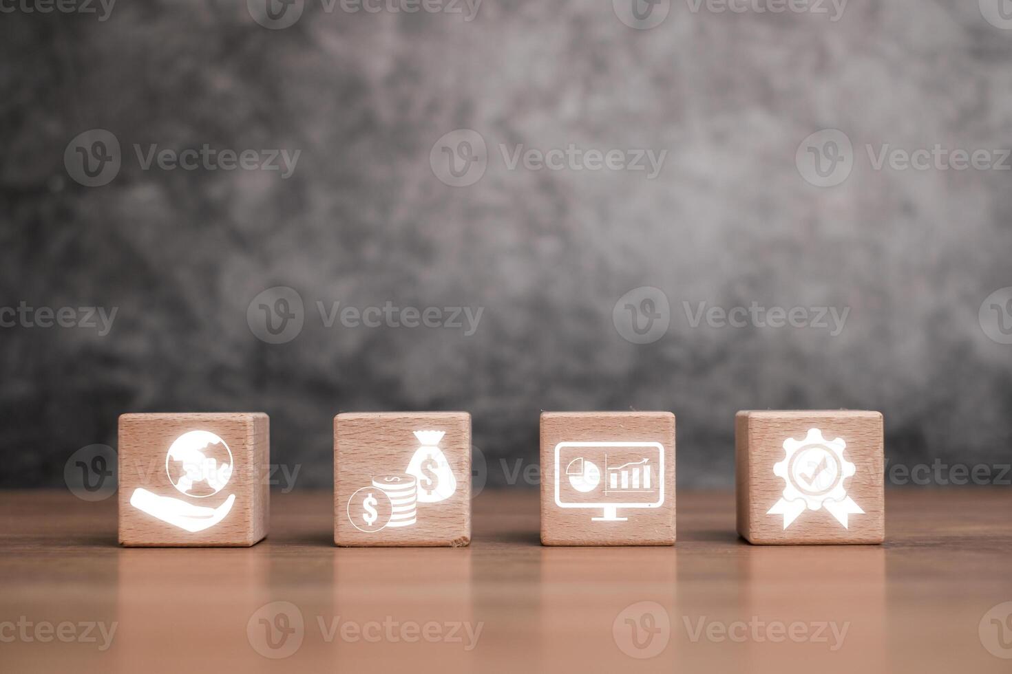 Wooden blocks displaying financial icons representing the concept of International Financial Reporting Standards. photo