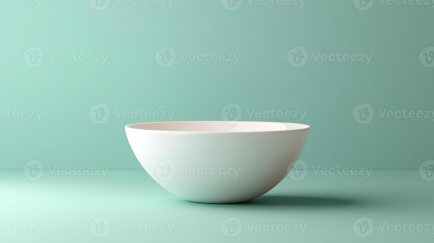 Simple White Ceramic Bowl on a Pastel Green Background Perfect for Showcasing Minimalist Table Settings and Modern Kitchen Decor photo