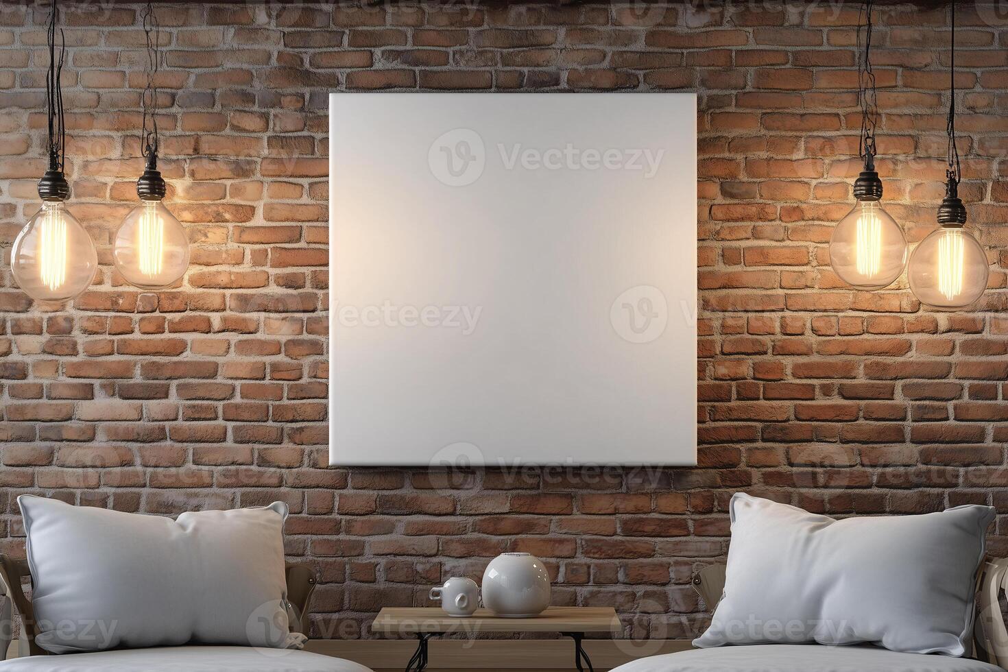 A white wall with a white framed picture and two lamps hanging above it photo
