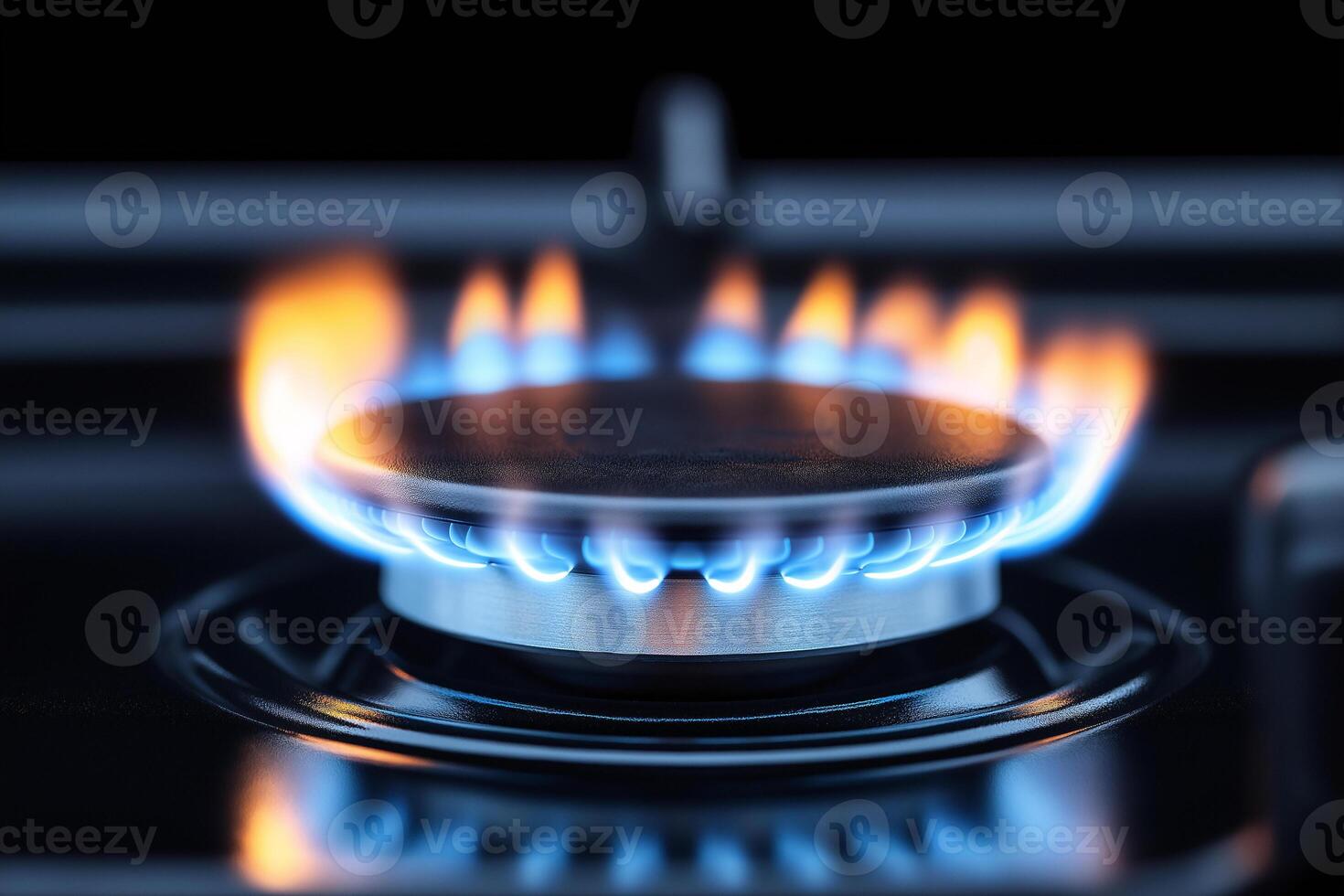 A gas stove with blue flames photo