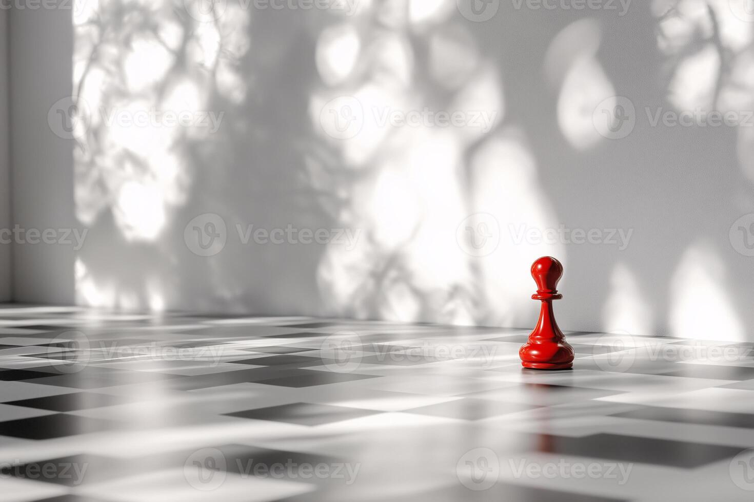 A red chess piece stands in front of a white wall photo