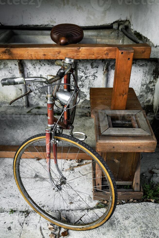 Front View of Vintage 1970s Bicycle in Rustic Warehouse Scene photo