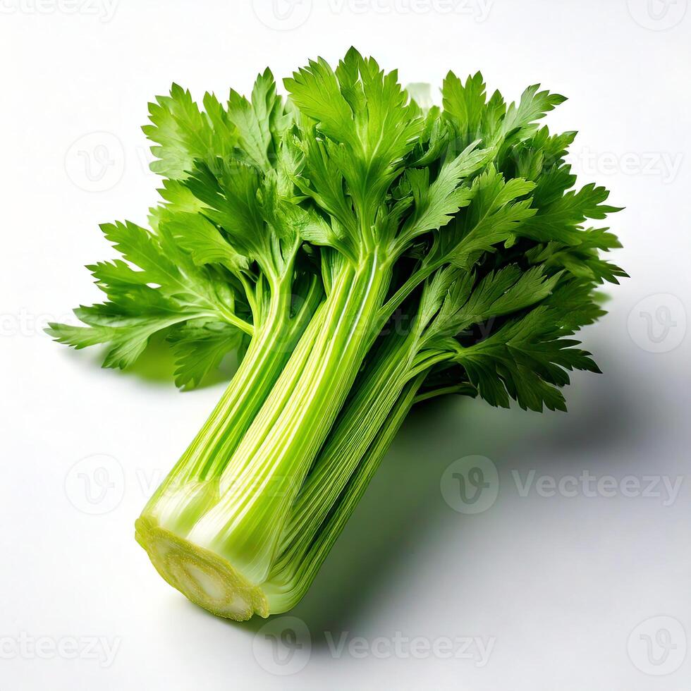 A bunch of celery on a white surface photo
