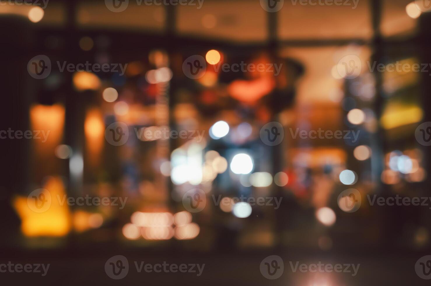 Abstract urban nightlife scene with defocused bokeh lights background photo