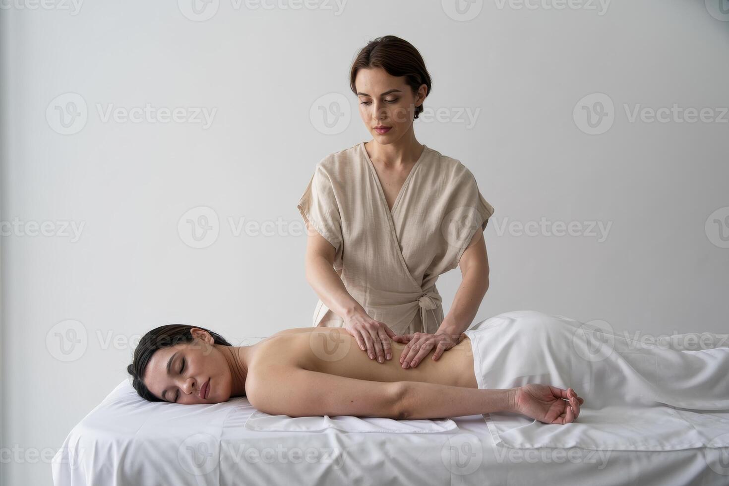 Professional massage therapy session promotes relaxation and wellness in a serene spa environment photo