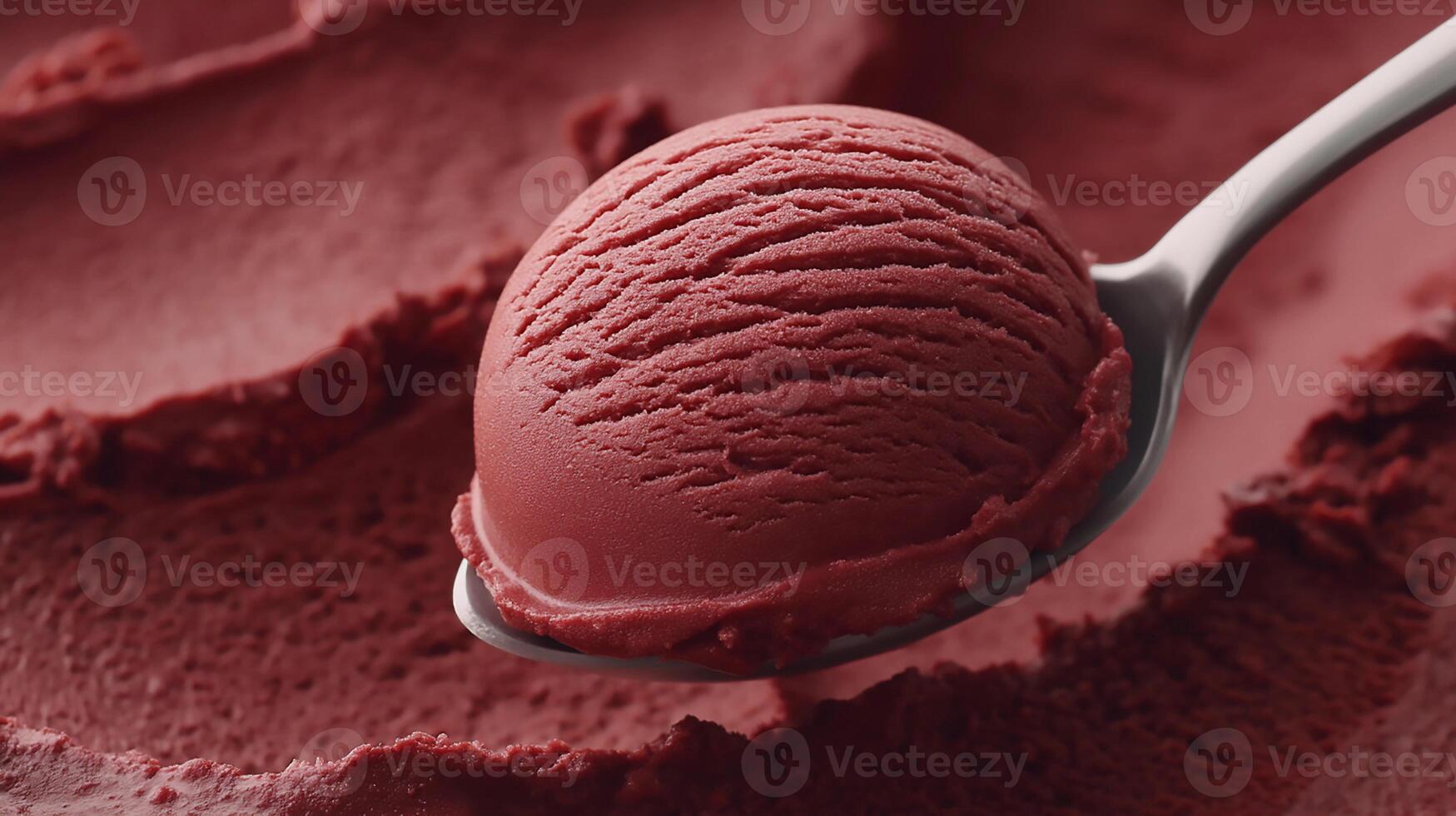 Delicious brown chocolate sorbet served on a spoon, showcasing its smooth texture and vibrant color photo