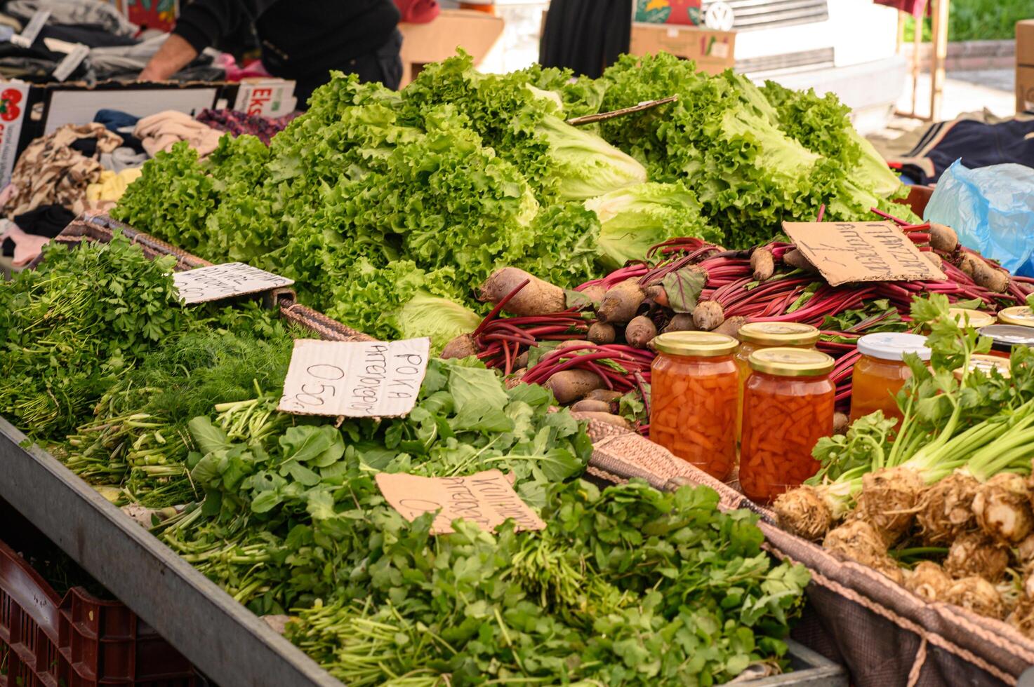 vibrant market scene with homemade jams, sauces, and pickles in jars, reflecting rich colors and textures. photo