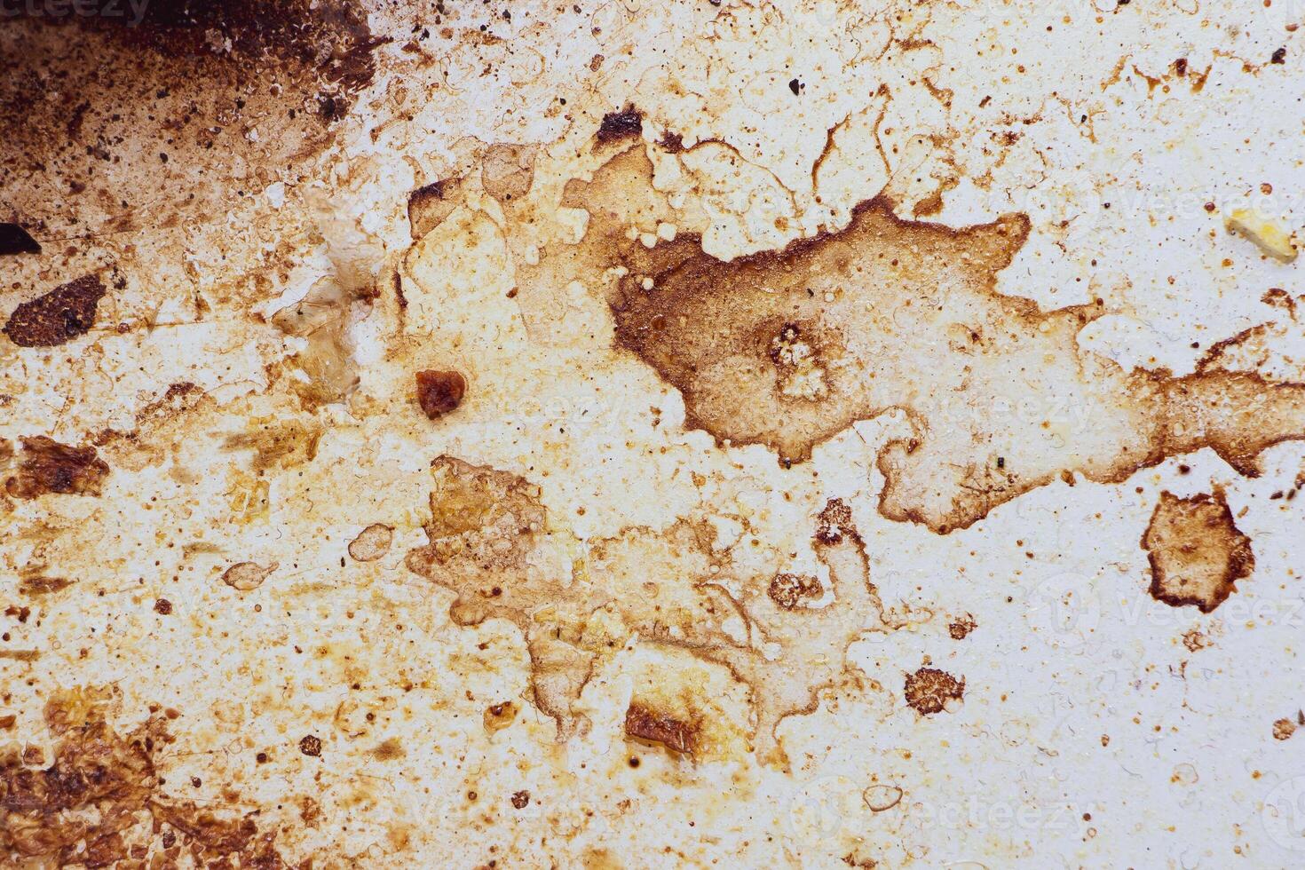 Texture of dirty stains and grease on stove photo