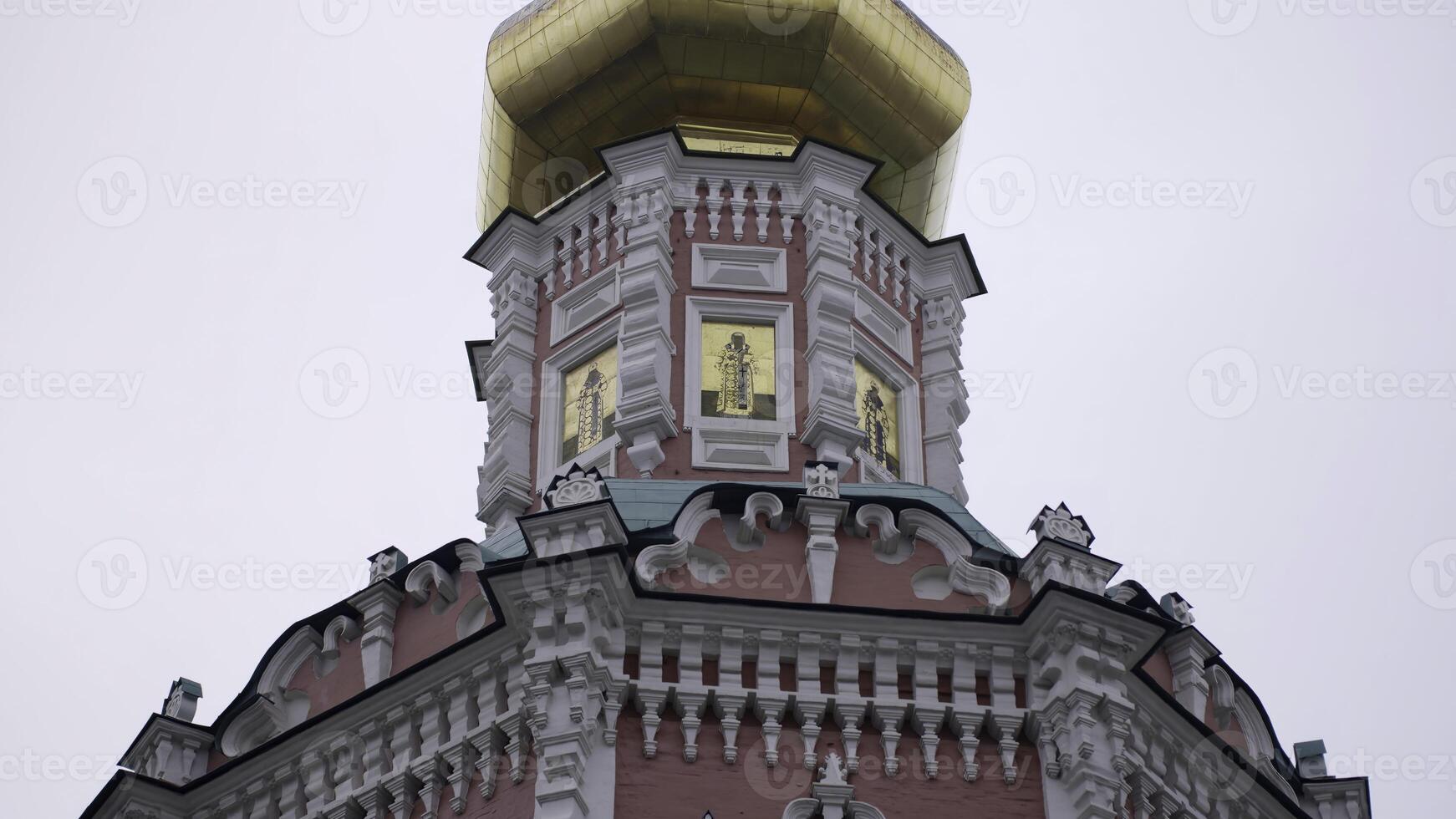 Golden cupola of the novodevichy convent reflecting light in moscow. Action photo