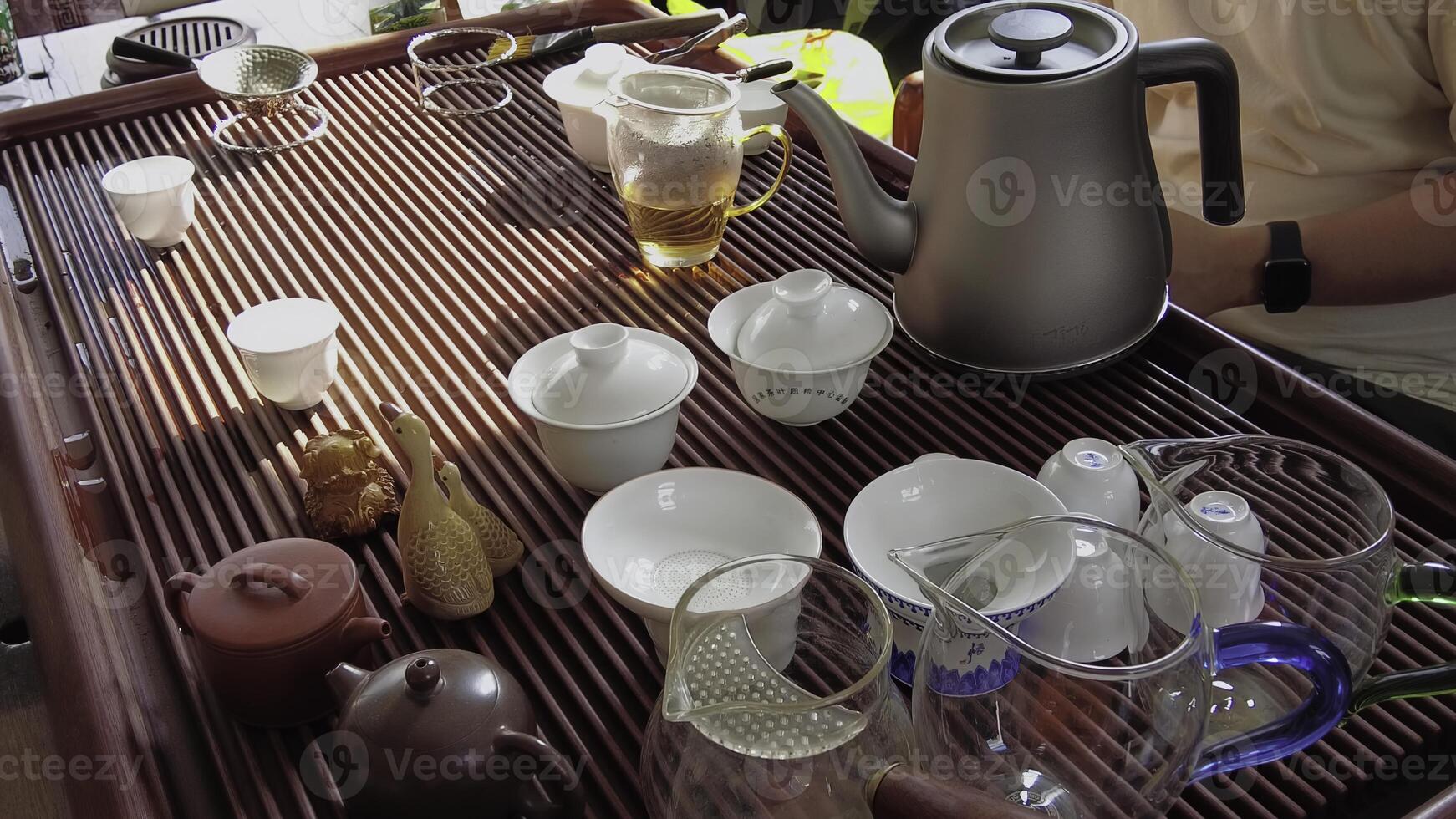 The Traditional Tea Ceremony Setup consisting of a beautifully crafted teapot and elegant cups. Media photo