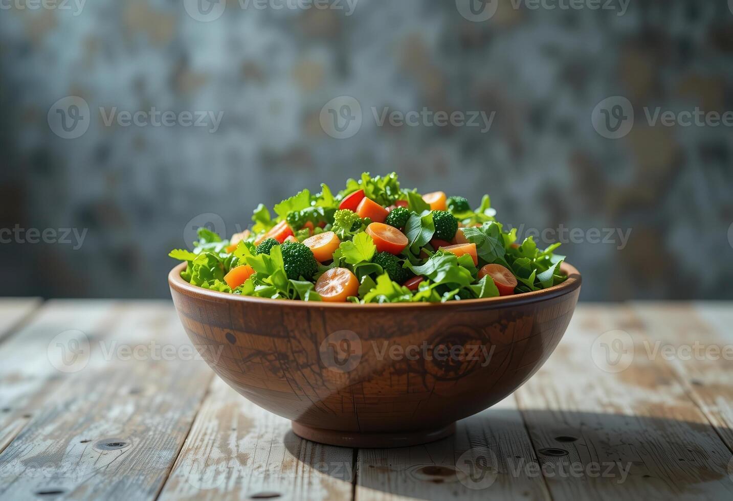 Fresh vegetable salad bowl on a rustic wooden table with textured background photo