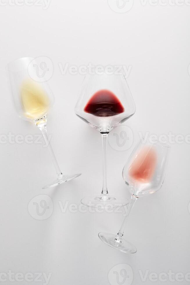 Evaluation of different types of wine pink, white, red. photo