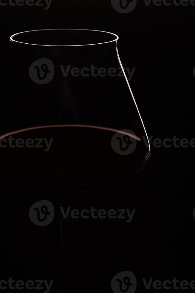 White and Red Linear Silhouette of Wine Glass Bowl on Black Background. photo