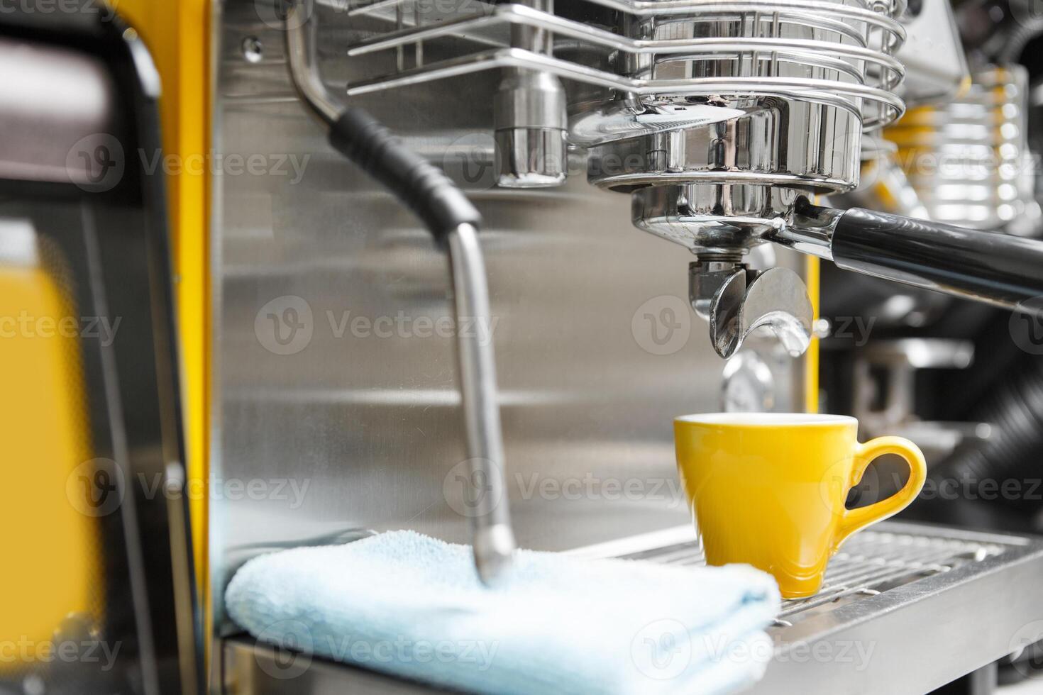 Close-Up of Professional Espresso Machine Preparing Fresh Coffee in Cafe photo