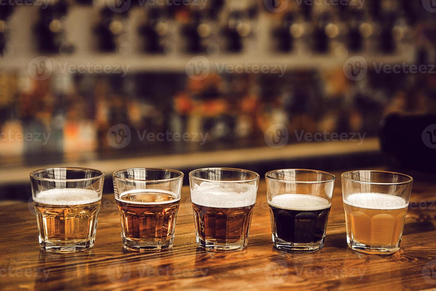 Exploring Five Unique Beer Varieties in Tasting Setup at Brewery photo