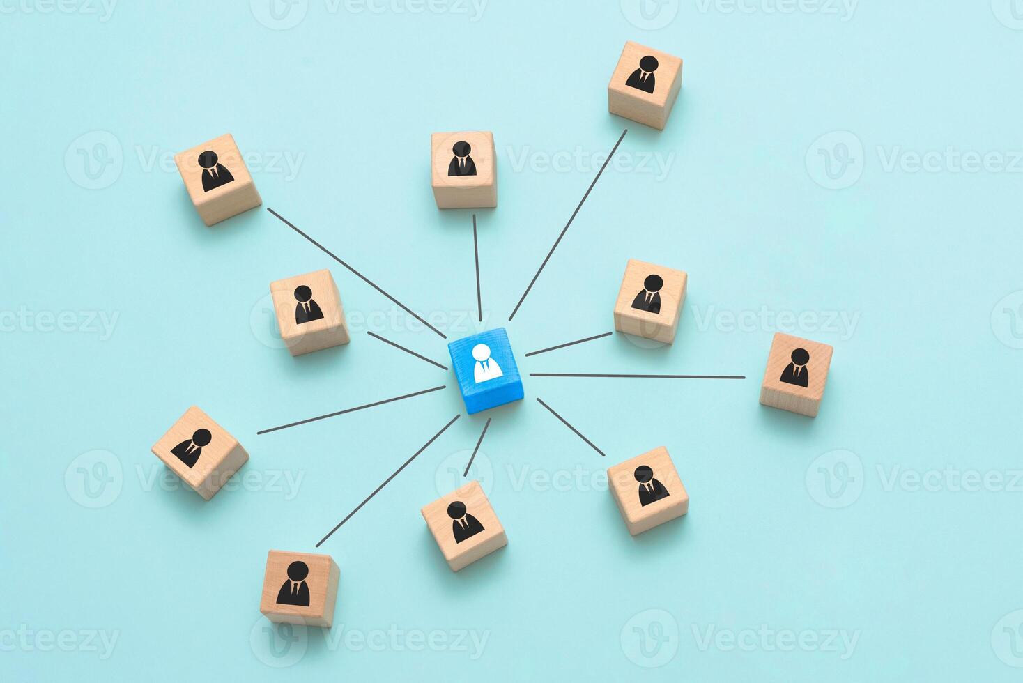 Social network concept with people connected by cubes on blue background photo