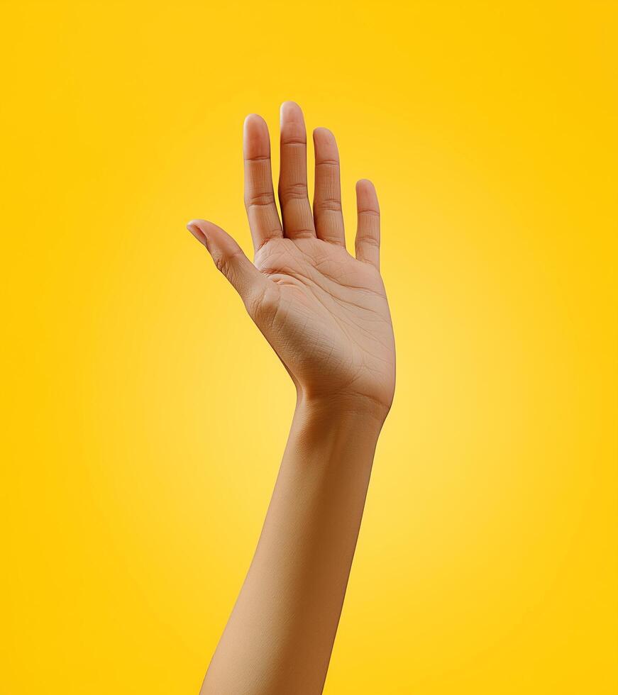 A hand is raised in the air photo